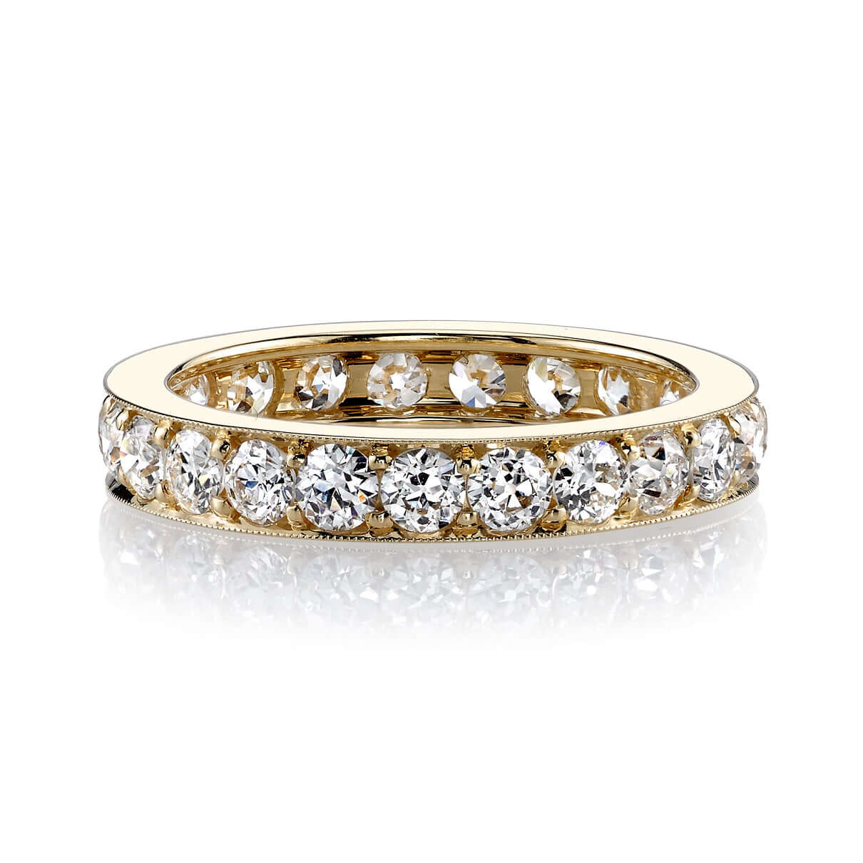 SINGLE STONE CARMELA MEDIUM BAND | Approximately 1.70ctw G-H/VS old European cut diamonds channel set in a handcrafted eternity band. Approximate band width 3.7mm. Please inquire for additional customization.